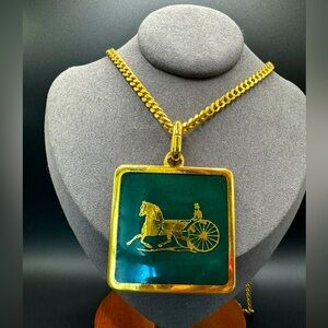 LOT 1349 1349 24K gold plated old Celine vintage necklace with carriage pendant
